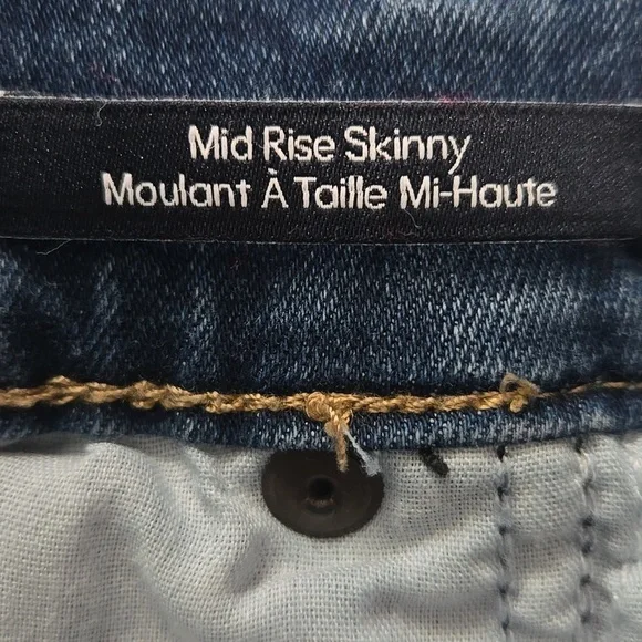 Calvin Klein Blue Mid Rise Skinny Jeans with Subtle Fading - Picture 7 of 7